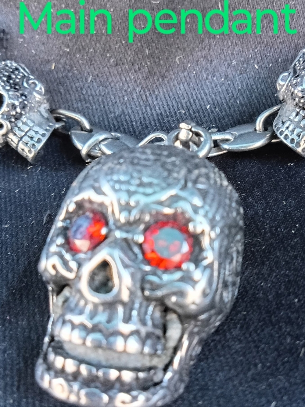 Sterling-Tone Skull Pendant Necklace with Red Crystal Eyes